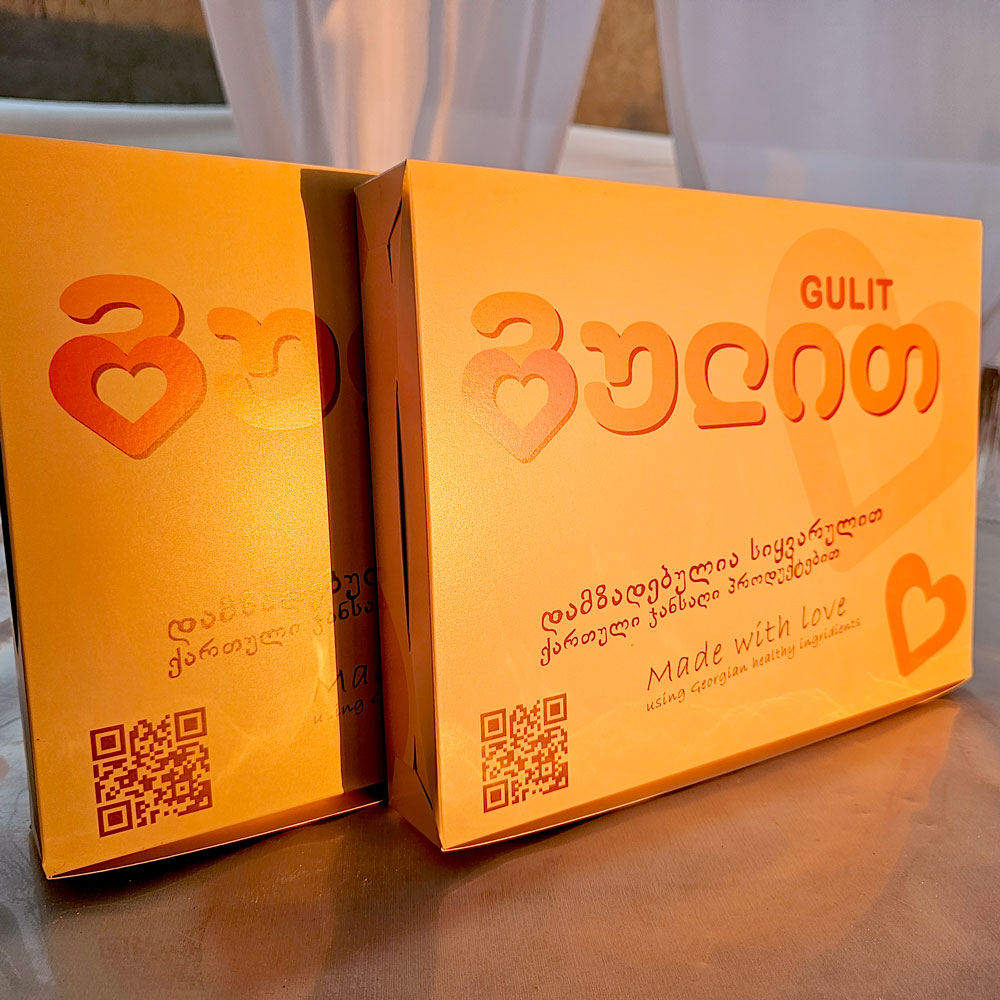 Two golden Gulit boxes ready to go
