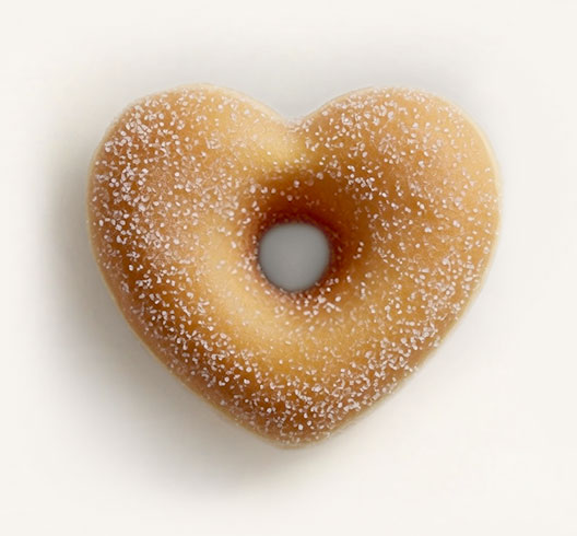 Shaping the heart-shaped donut before baking